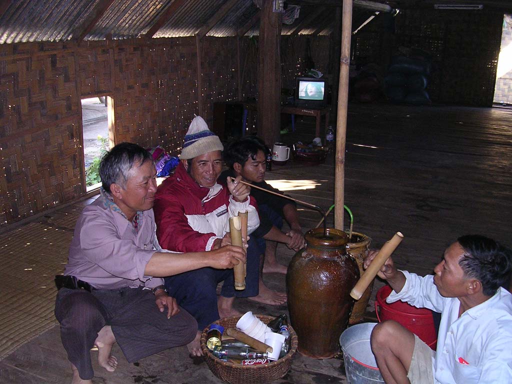 Ted samples some rice wine with the locals at Lak Lake