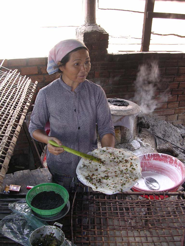 An odd but tasty snack: a sandwich of cooked rice paper, with uncooked rice paper inside
