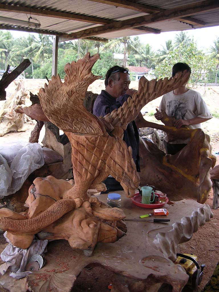 A carving of an eagle catching a snake