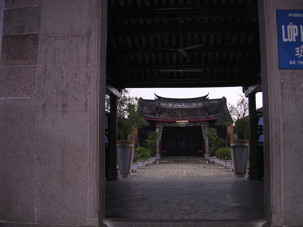 One of the many splendid old buildings you can see through open gates...
