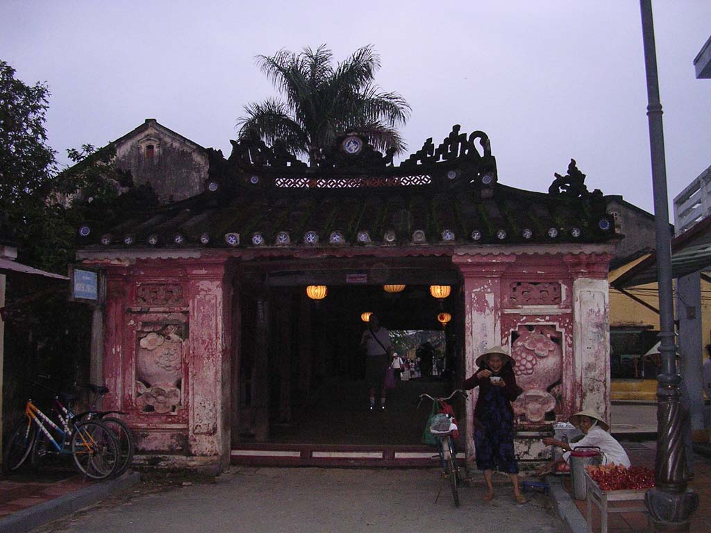 The west side, with a lady enjoying a bowl of soup and a joke with her friend