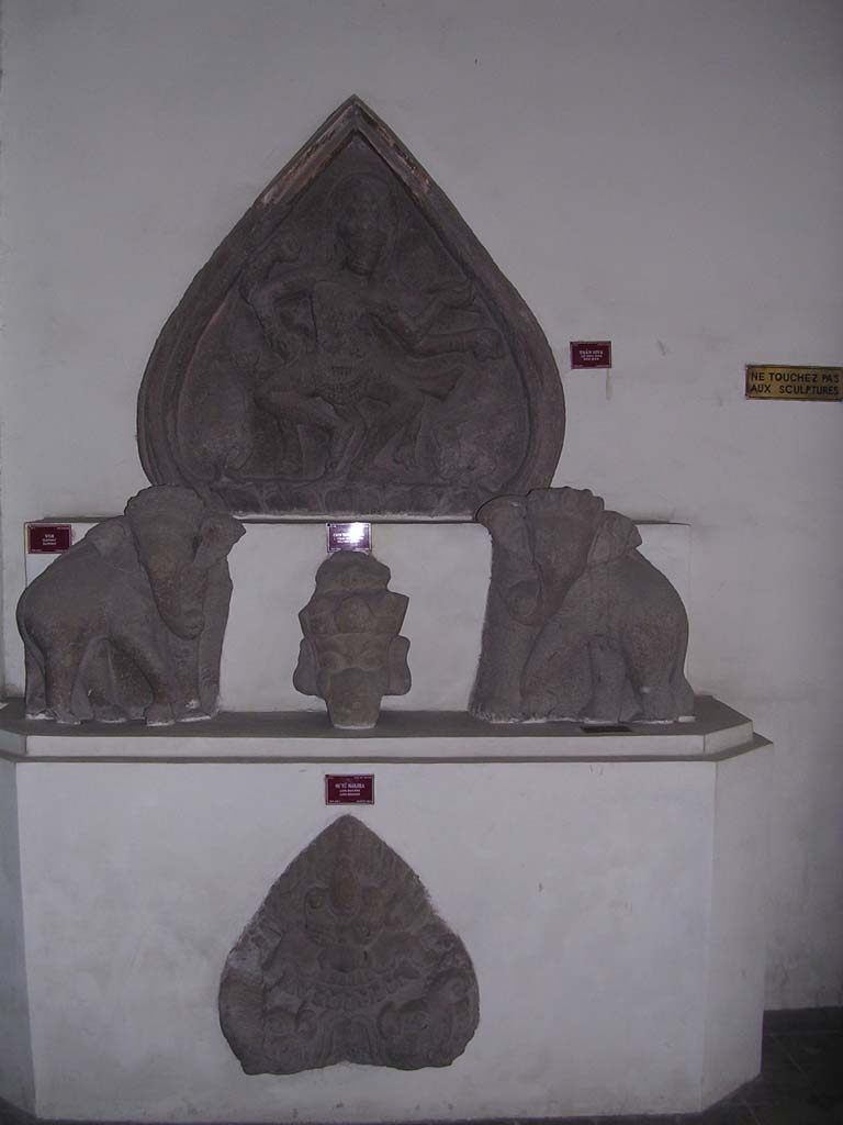 A many-armed god, elephants, etc.