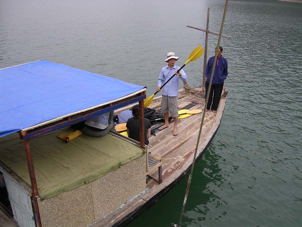 Our guide Ngoc (in the hat) ready to take some of our group kayaking