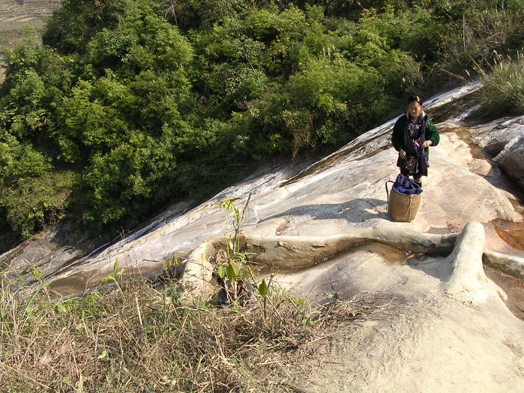 A member of the local sales force lying in wait at the top of the 45° angled waterfall