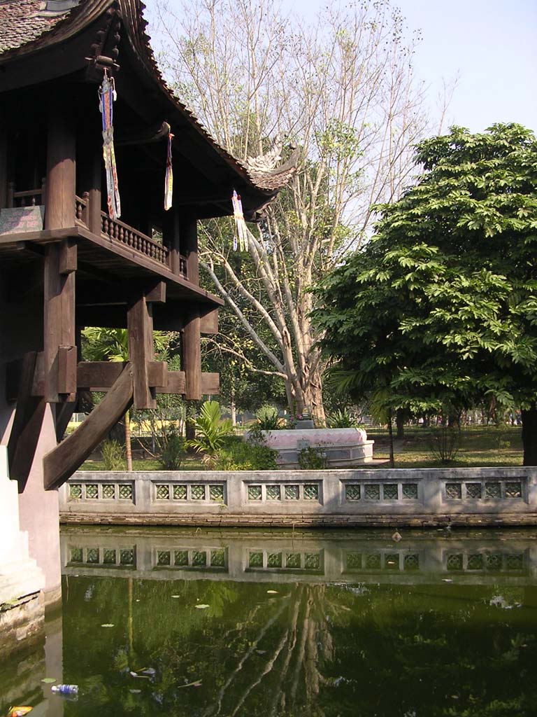 Past the One Pillar Pagoda towards the trees in the park