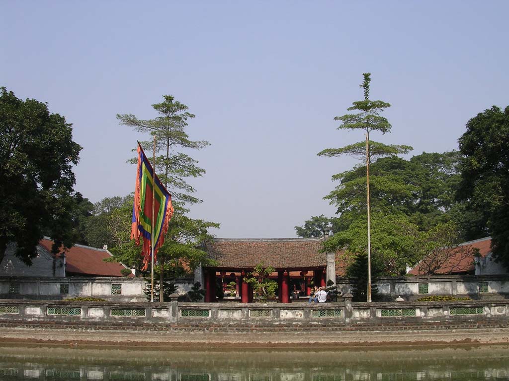 Across one of the carp-filled ponds to a pavilion