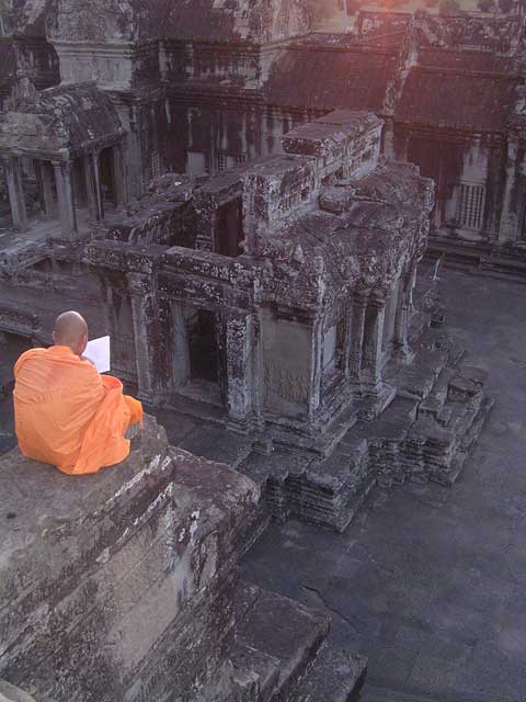 A monk relaxes with a good read