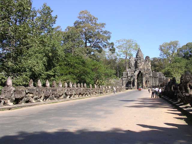 Approaching the south gate, showing some of the 54 gods on the left, busy Churning the Ocean of Milk