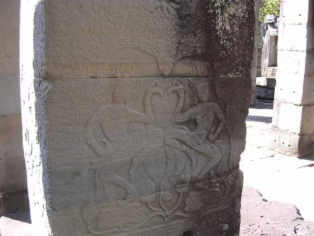 Carving of two <em>apsara</em> (angelic dancers)