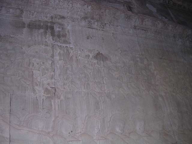 Churning of the Ocean of Milk: <em>apsara</em> (angelic dancers) above the serpent