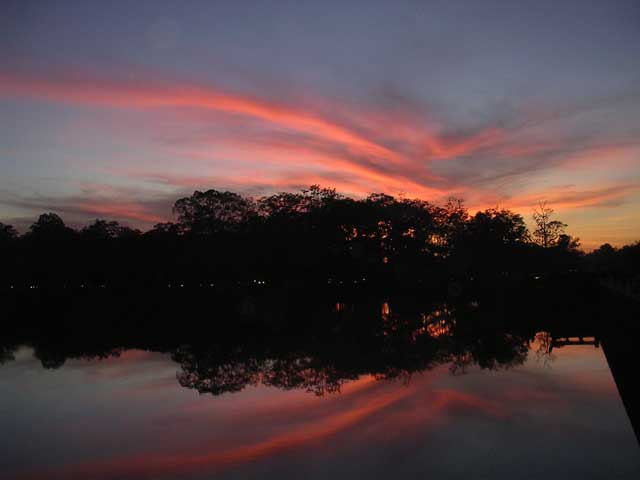 Sunset reflected in the moat at Angkor Wat