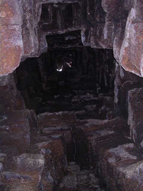 Looking up the inside of a tower, showing the construction
