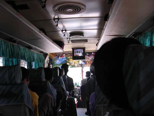 In-bus entertainment: Cambodian karaoke videos (probably made in Long Beach, California)