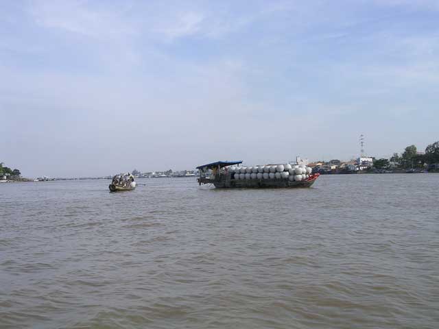 A boatload of pots on the Mekong