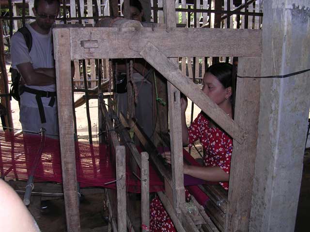 Weaving, probably a sarong (Michelle and Darren look on)