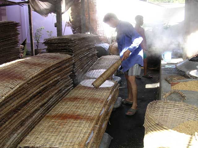 Laying the pancakes out on the drying racks