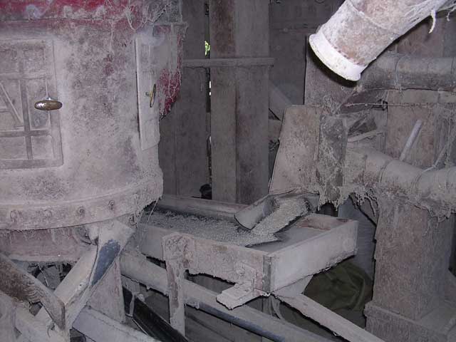 More rice going down a chute, heading for the bag