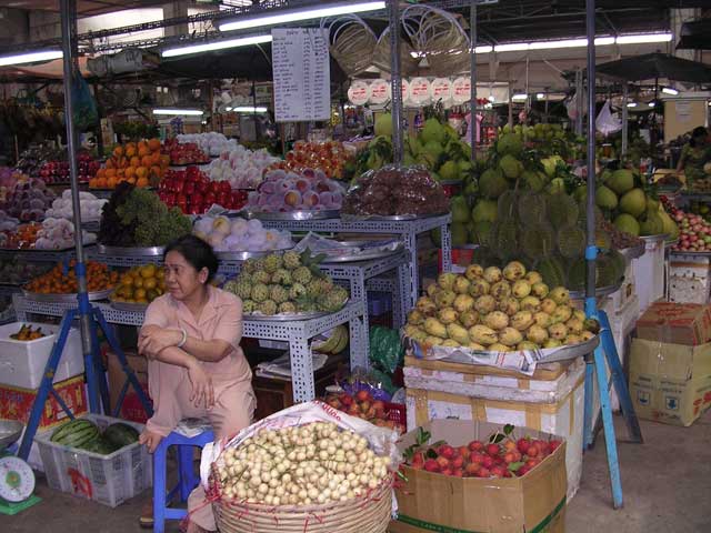 Waiting for a customer for her wonderful fruit