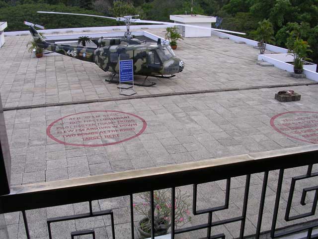 Old military helicopter on the roof, with markings where VC spy Nguyen Thang Trung bombed the palace in the final weeks of the war
