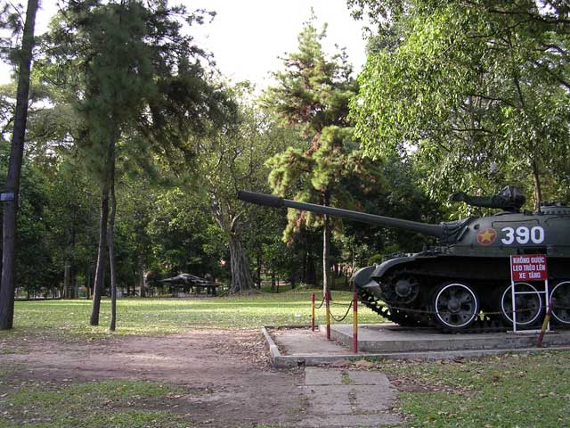 A preserved tank in the grounds, with a fighter plane in the background