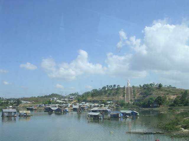 Over the water to a very impressive (war?) memorial, from the bus from HCMC to Dalat.