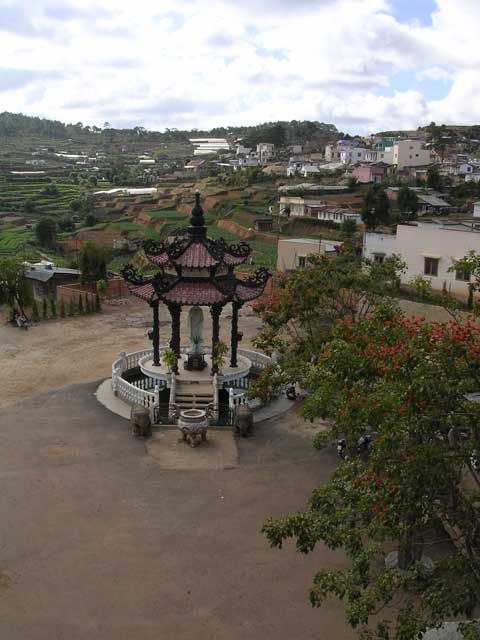Looking down to the ornamental building in the yard