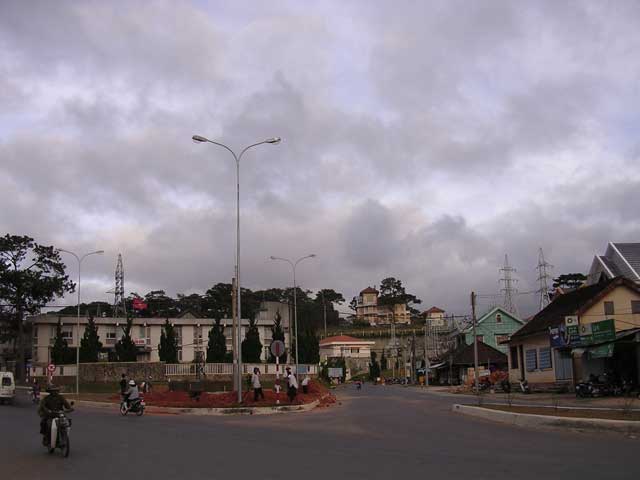 The museum is on top of the hill at the end of the street in the middle