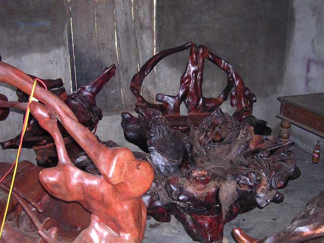 There's a chair at the back - that may be a table in front of it