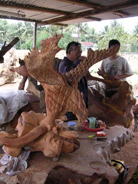 A carving of an eagle catching a snake