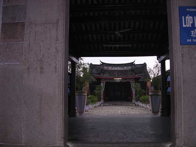 One of the many splendid old buildings you can see through open gates...