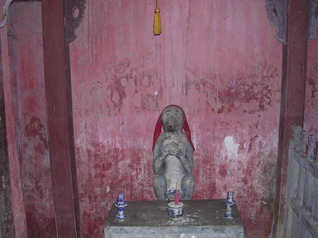 One of the monkeys that guard the Japanese Covered Bridge in Hoi An, Vietnam
