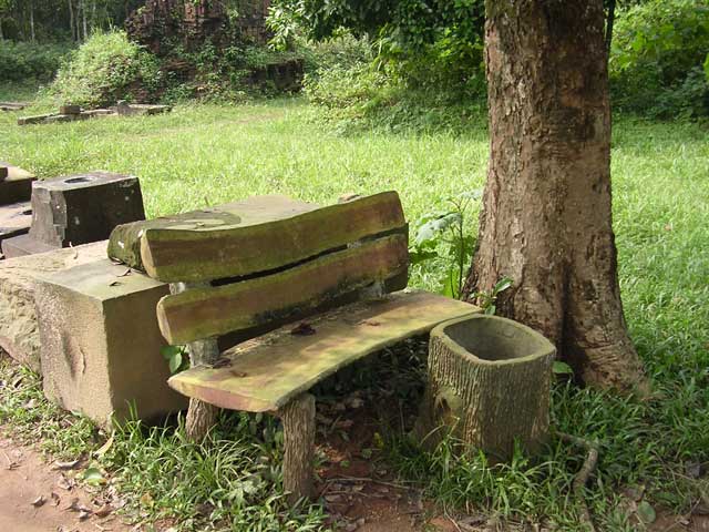Concrete bench and waste bin made to look like wood