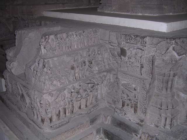 Corner of a finely carved pedestal