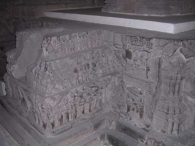 Corner of a finely carved pedestal