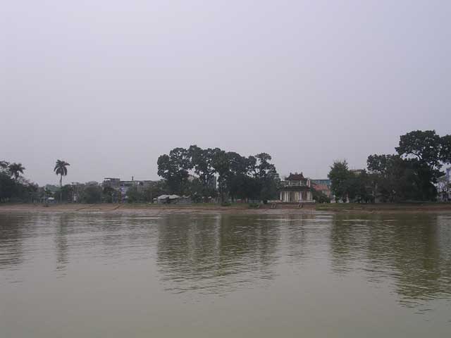 A rather fine gate? temple? by the river bank
