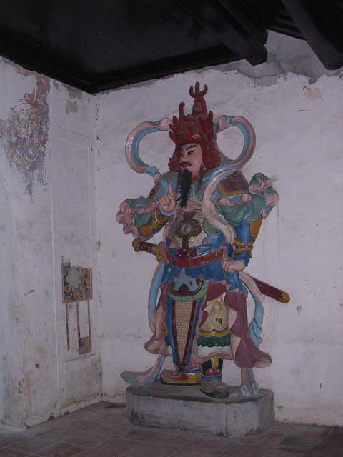 One of the guards on the gate (we're on the way back up river so it's darker now)