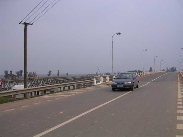 The modern bridge carrying Highway 1. The old bridge is visible alongside.