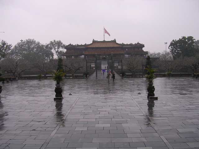 On our way out, looking back across the very wet courtyard to Trung Dao Bridge