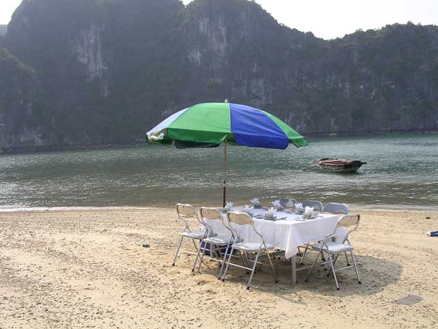 The table laid for lunch on Van Boi island, Ha Long Bay, Vietnam