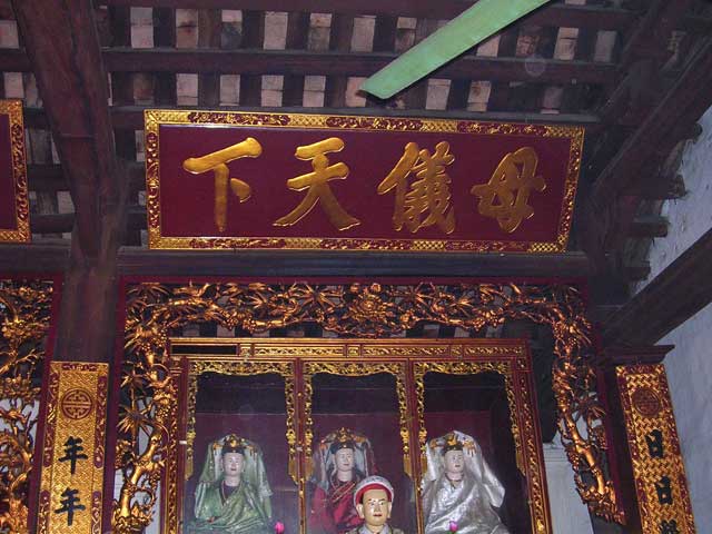 ...with a large sign in Chinese (and a ceiling fan) above