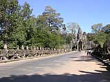 Approaching the south gate, showing some of the 54 gods on the left, busy Churning the Ocean of Milk