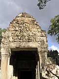 Carving of monkeys vs. demons (Hindu theme) on the lintel over that same entrance