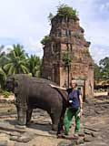 Mary makes friends with one of the stone elephants