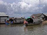 Pair of covered boats at Chong Kneas, Cambodia