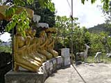 Golden monks at Wat Phnom Sampeau