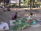 Weighing spring onions ready for market in Cambodia