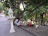 Flower sellers on the path