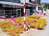 Incense sticks drying by the road