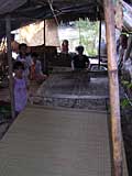 Weaving a mat with wire from tree bark. A 1 x 2 metre mat takes about an hour to make.