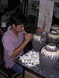 Applying eggshell at the Tay Son lacquer factory